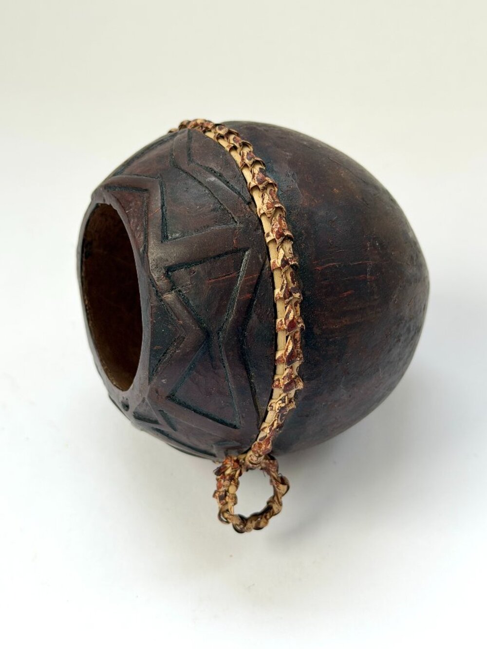 Vintage Hand-Carved Coconut Vessel with Woven Fiber Strap